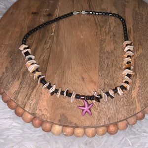 Seashell choker with purple starfish pendant